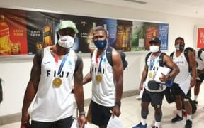 Fiji's champion sevens team arrive home.
