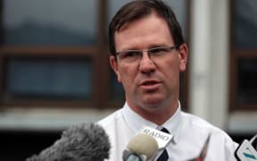 Detective Inspector Darrin Thomson during the news conference.