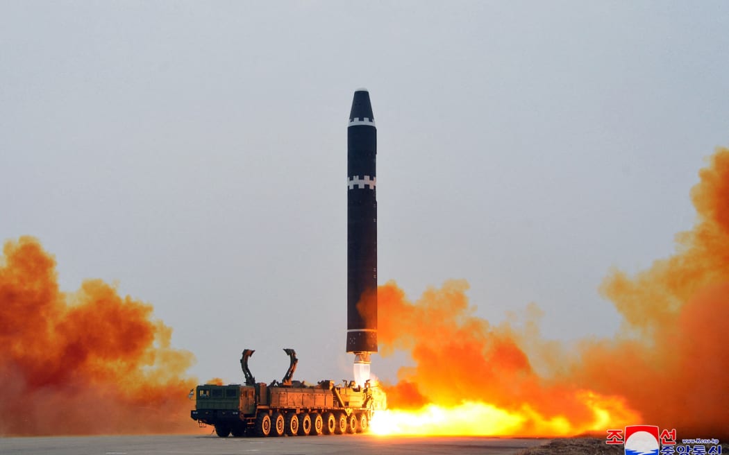 This picture taken on February 18, 2023 and released from North Korea's official Korean Central News Agency (KCNA) on February 19, 2023 shows test-firing of the intercontinental ballistic missile (ICBM) "Hwasong-15", at Pyongyang International Airport. (Photo by STRINGER / KCNA VIA KNS / AFP) / South Korea OUT / ---EDITORS NOTE--- RESTRICTED TO EDITORIAL USE - MANDATORY CREDIT "AFP PHOTO/KCNA VIA KNS" - NO MARKETING NO ADVERTISING CAMPAIGNS - DISTRIBUTED AS A SERVICE TO CLIENTS / THIS PICTURE WAS MADE AVAILABLE BY A THIRD PARTY. AFP CAN NOT INDEPENDENTLY VERIFY THE AUTHENTICITY, LOCATION, DATE AND CONTENT OF THIS IMAGE --- /