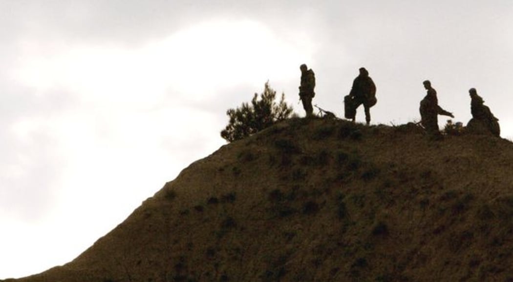 Hallowed ground - Modern Turkish soldiers stand where their forebears repulsed Anzac troops after the 1915 Gallipoli landings.
