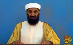 This framegrab from an undated video released by the US Department of Defense on May 7, 2011, reportedly show Al-Qaeda leader Osama bin Laden making a video at his compound in Abbottabad, Pakistan.