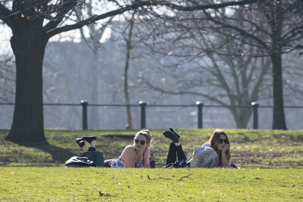 Women in Hyde Park in central London as the capital basks in sunshine. 24 February 2019.