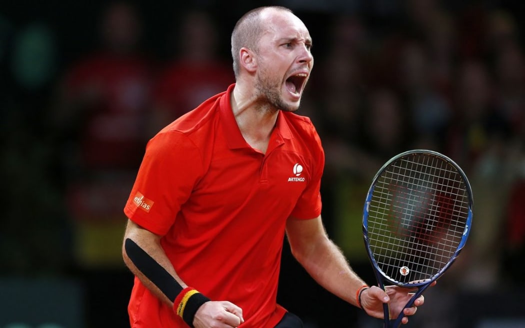 Belgian tennis player Steve Darcis celebrates victory