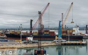 Container ship in commercial port of Napier, New Zealand.