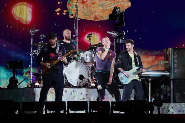 Coldplay with lead singer Chris Martin performing at the National Stadium, the first night of the band’s six concerts, 23 January 2024. The Singapore shows are the band’s longest Asian stint in their Music Of The Spheres world tour. (Photo by Gin Tay / ST / SPH Media via AFP)