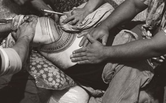 NZ artist Tony Fomison receiving his pe'a. Image from 'Tatau - A History of Samoan Tattooing'