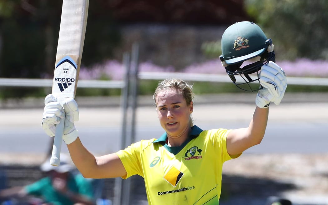 Australia's Ellyse Perry celebrates her century.