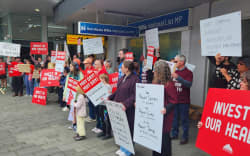 Executive director for the Association of Salaried Medical Specialists, Sarah Dalton, pictured here with loud speaker, says while Finance Minister Nicola Willis has declined to meet striking doctors today, the government needs to hear their message on what under-funding is doing to the public health system.