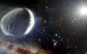 This illustration shows the distant Comet Bernardinelli-Bernstein as it might look in the outer Solar System.