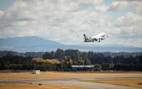 Air New Zealand plane taking off from Christchurch airport