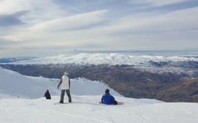 Skiers and snowboarders at Cardrona Alpine Resort