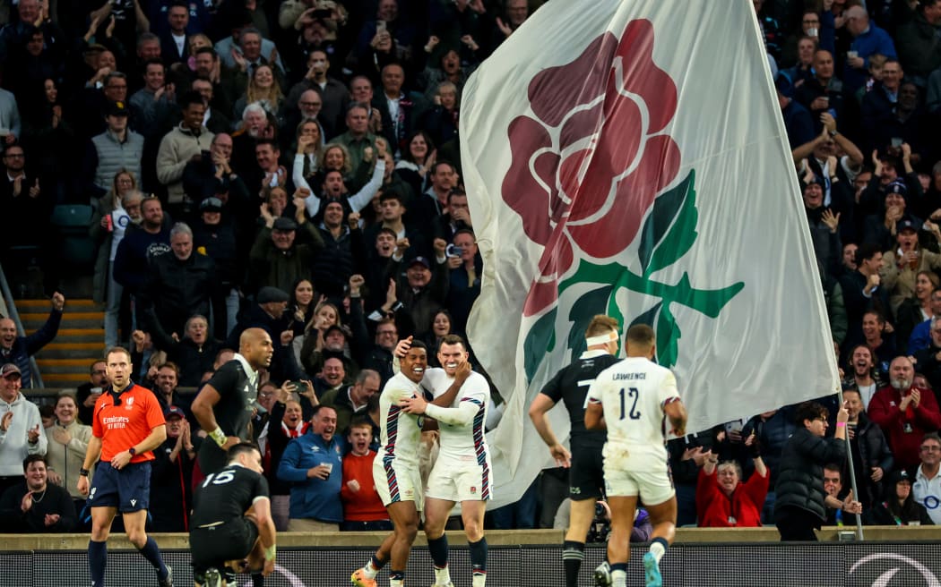 England winger Immanuel Feyi-Waboso celebrates a try against the All Blacks at Twickenham.