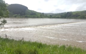 Water continues to pour into flood plains near Dunedin.