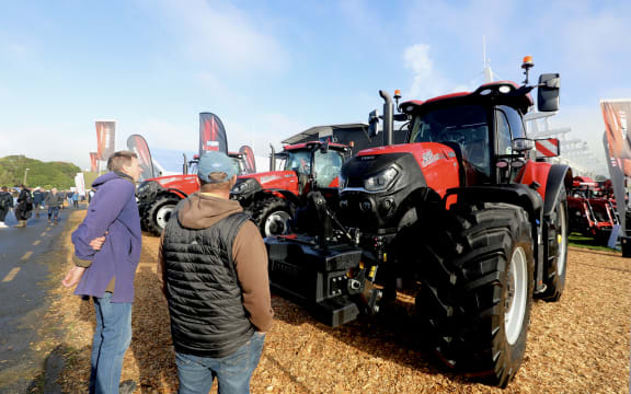 Fieldays attendees scoping the tractors at Fieldays.