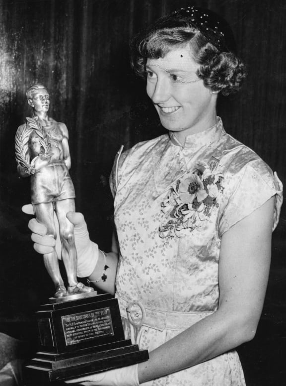 New Zealand Olympic gold medalist Yvette Williams with the 1952 Sportsman of the Year trophy in Dunedin, New Zealand.