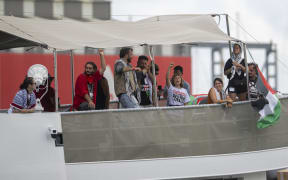 The Global Sumud Flotilla sets sail from Barcelona towards Gaza, in Barcelona, Spain, on August 31, 2025. Hundreds gather at Moll de la Fusta to bid farewell to the flotilla, with dozens of boats and thousands of supporters wearing kufiyas (Palestinian scarves) and waving flags.  (Photo by Lorena Sopena/NurPhoto) (Photo by Lorena Sopena / NurPhoto via AFP)