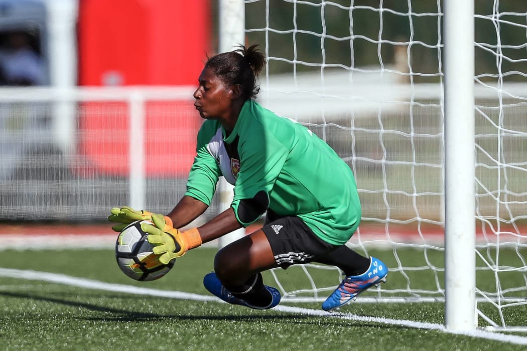 Betty Sam saved a first-half penalty to keep PNG in the game.