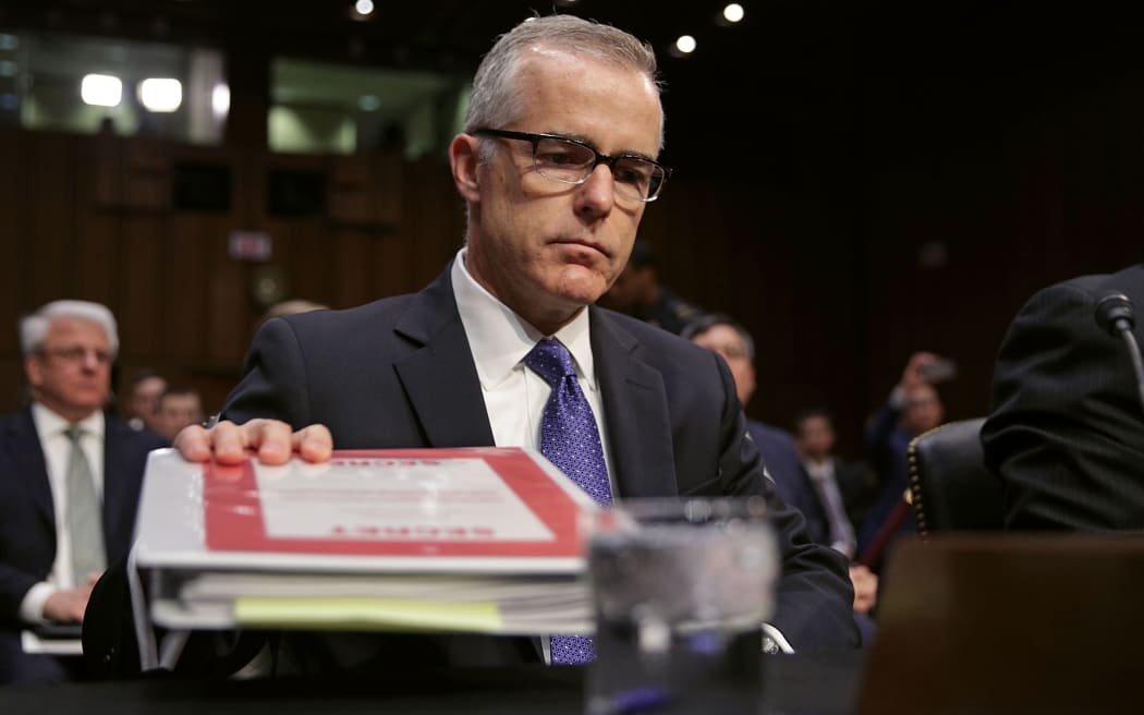Acting FBI Director Andrew McCabe and the other heads of the U.S. intelligence agencies prepare to testify before the Senate Intelligence Committee in the Hart Senate Office Building on Capitol Hill May 11, 2017 in Washington, DC.