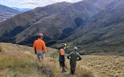 DOC staff working on the rerouted section of the Motatapu Track.