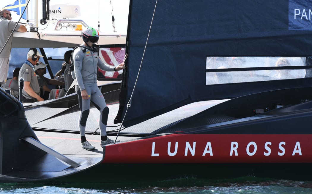 Jimmy Spithill and Luna Rossa wait for postponed racing to start on Day 4 of the America's Cup.