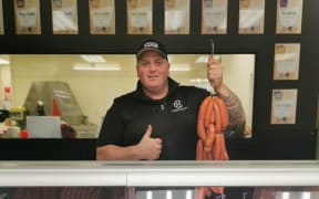 Rob Cameron with some Pork Chorizo sausages he made.