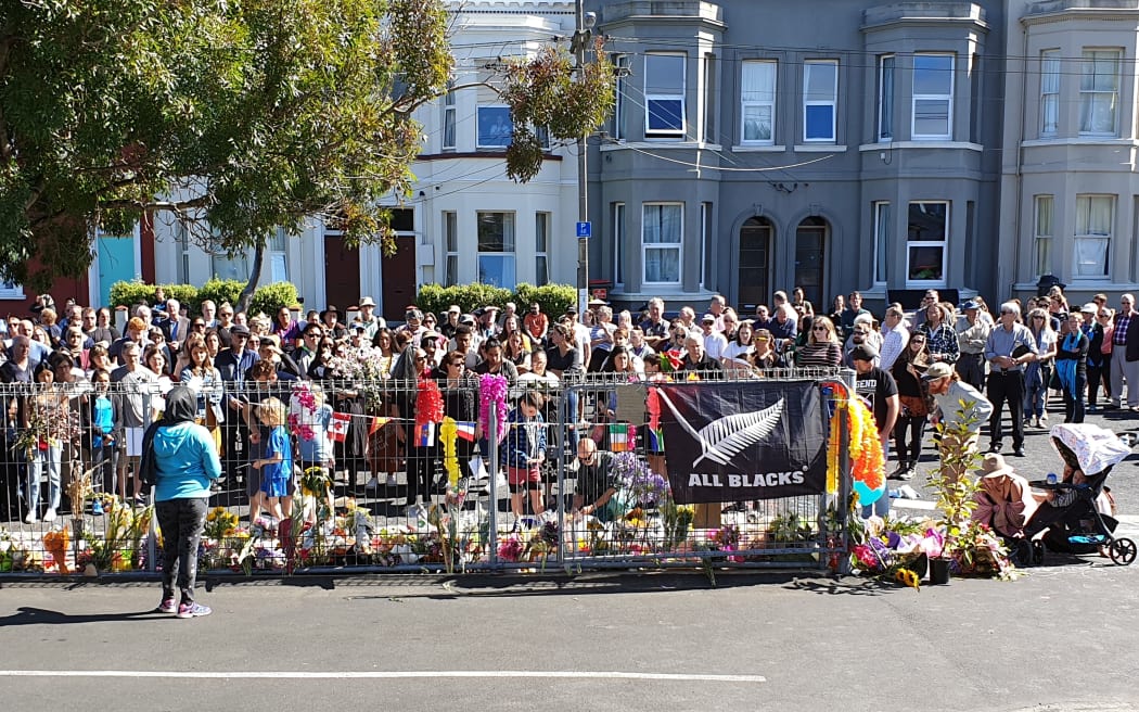 A crowd of hundreds gathered outside Dunedin's Al Huda Mosque ahead of afternoon prayers.