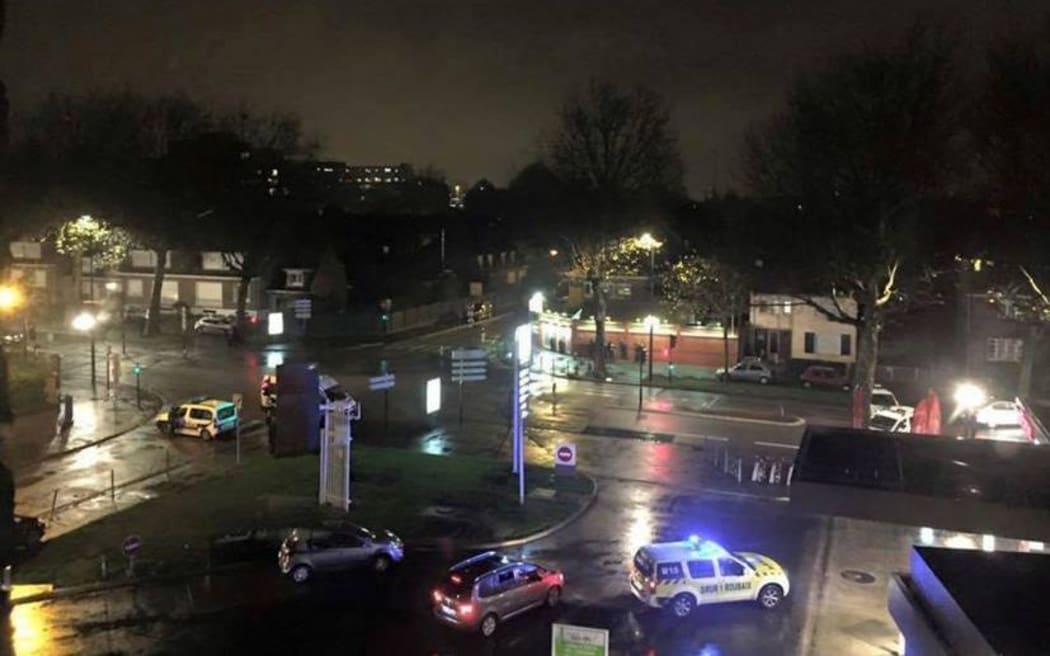Armed men took hostages in Roubaix, northern France, but police said it was not linked to the Paris attacks.