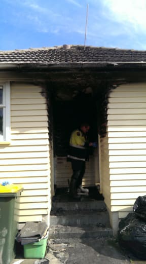 Fire investigators are questioning why smoke alarms were removed from an Otara property.