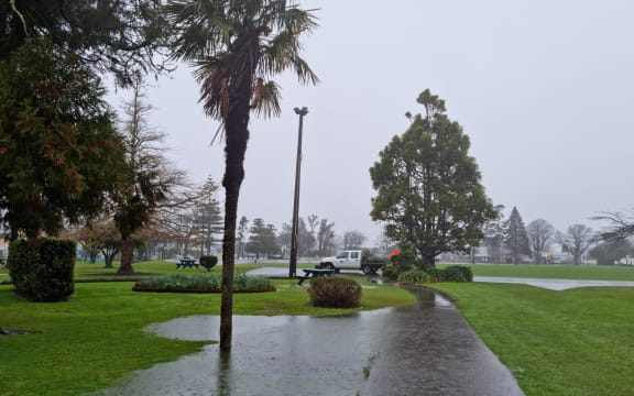 Drain flooding Victoria Square near the Emergency Operations Centre in Westport.