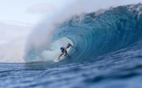 Owen Wright of  Australia winning in Round 4 of the Billabong Pro Tahiti at Teahupoo, Tahiti on 24 August 2015.