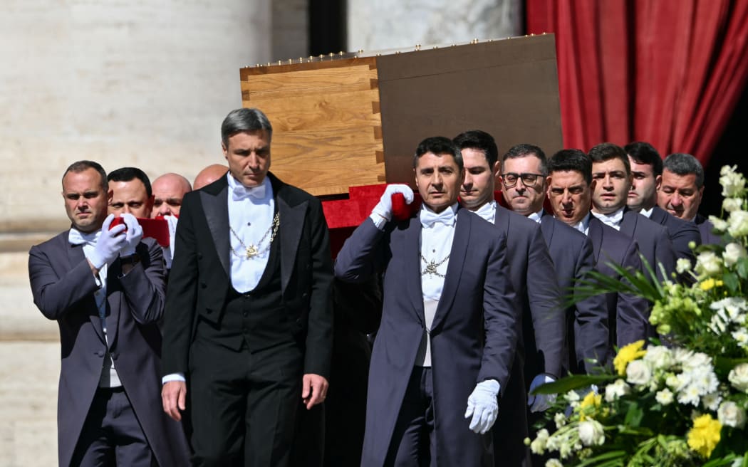 Pallbearers carry the coffin of late Pope Francis during the funeral ceremony in St Peter's Square, at the Vatican, on April 26, 2025. (Photo by Alberto PIZZOLI / AFP)