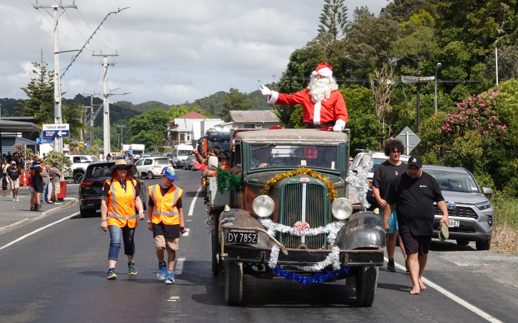 Santa makes his way down Kāeo’s main street on a 1933 Chrysler Fargo truck.