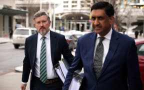 Rep. Thomas Massie (left) and Rep. Ro Khanna arrive to offices of the Department of Justice on Monday in Washington, DC. Alex Wong/Getty Images