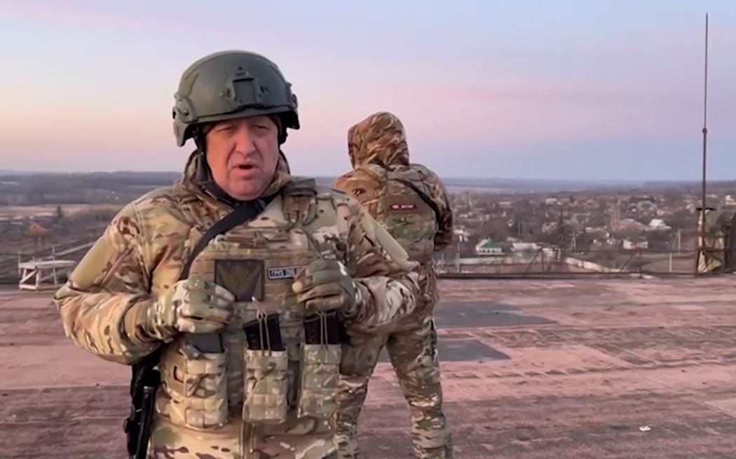 This grab taken from a video posted on Telegram channel @concordgroup_official on 3 March 2023, shows Yevgeny Prigozhin, the chief of the Russian paramilitary group Wagner, speaking from a rooftop at an undisclosed location.