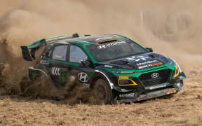 New Zealand rally driver Hayden Paddon in the Hyundai Kona EV rally car