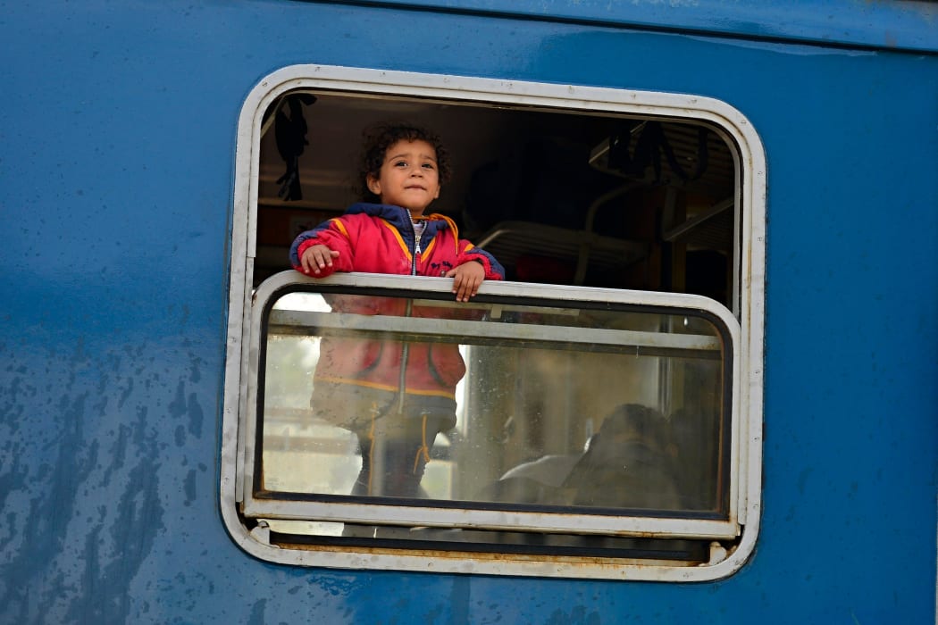 A child refugee heading into Austria from Hungary.