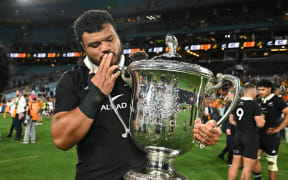 Pasilio Tosi of the All Blacks with the Bledisloe Cup.