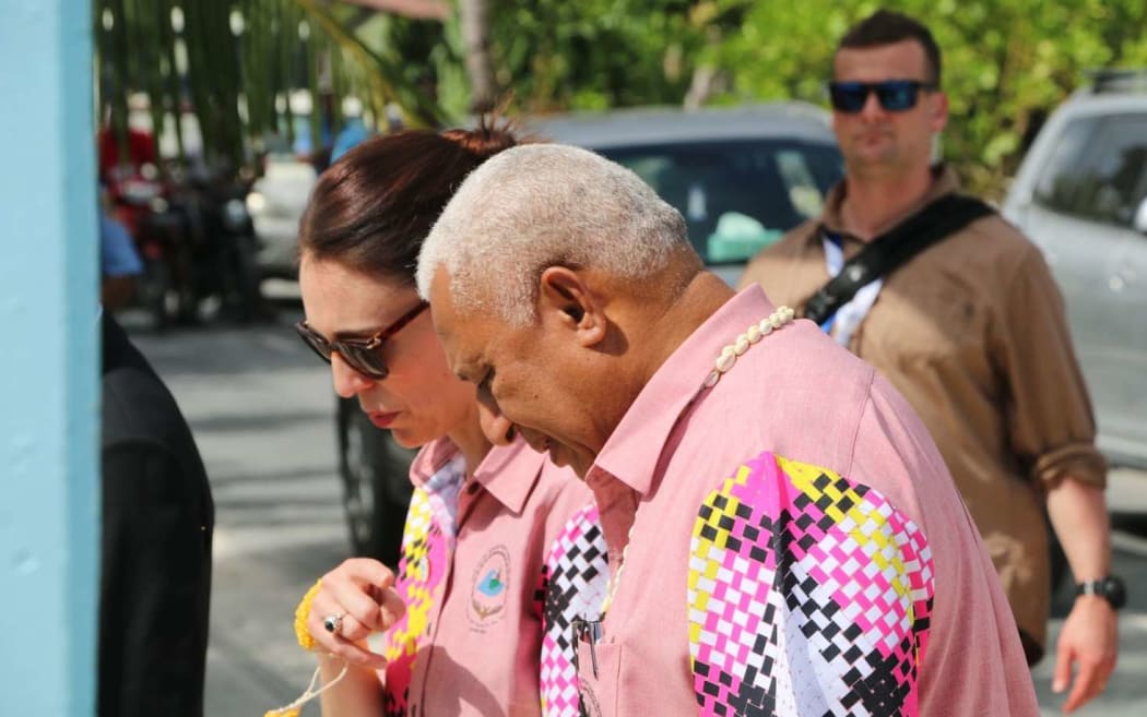 New Zealand prime minister Jacinda Ardern and Fiji prime minister Frank Bainimarama chat on the sidelines of last year's Pacific Islands Forum in Tuvalu.