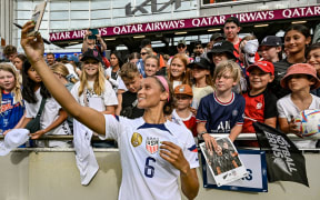 Lynn Williams of USA takes a selfie with fans in New Zealand in January 2023.