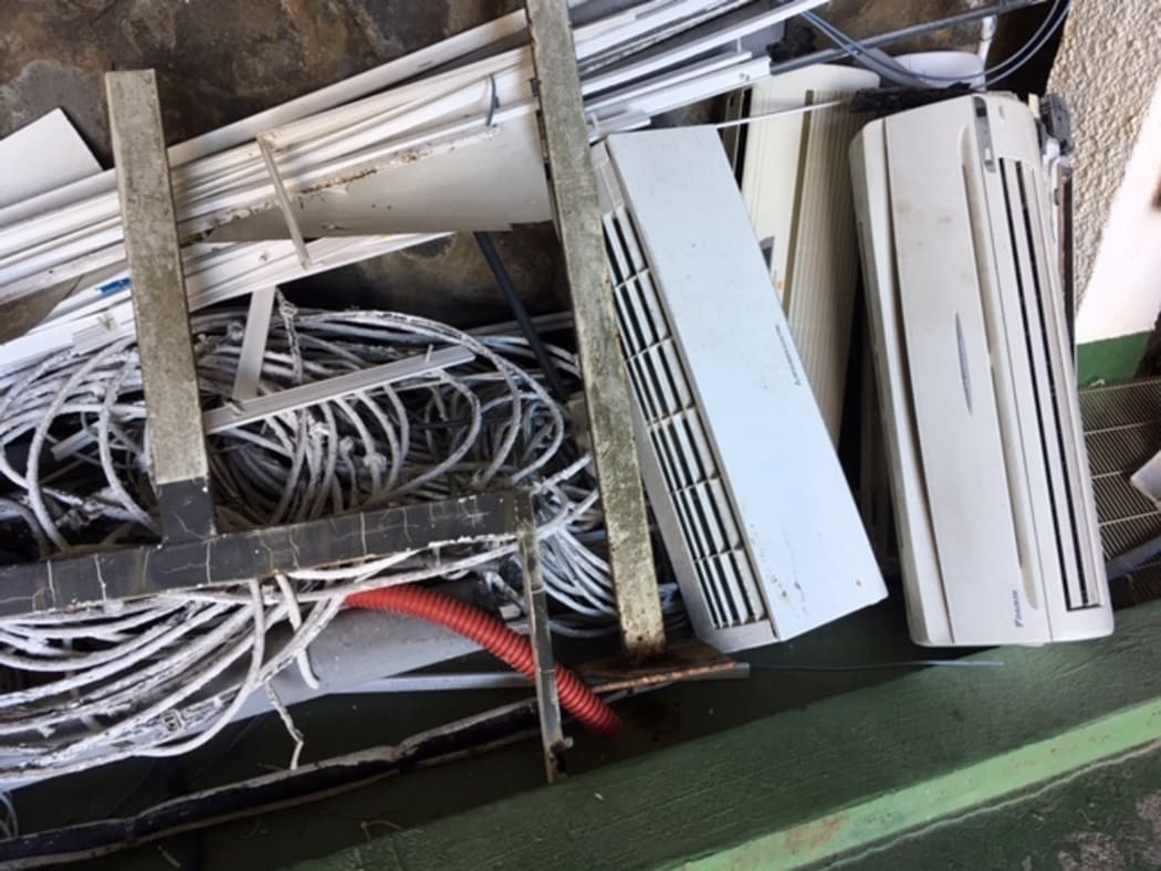 Dismantled air conditioning units at former Chinese consulate in Tahiti