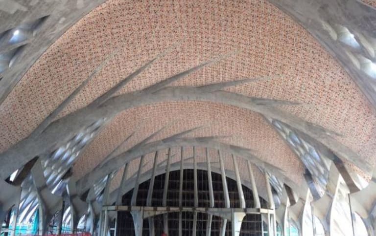A ceiling made from ceramic tiles designed in leaf-like form at the Marisfrolg Headquarters in Shenzhen, China.