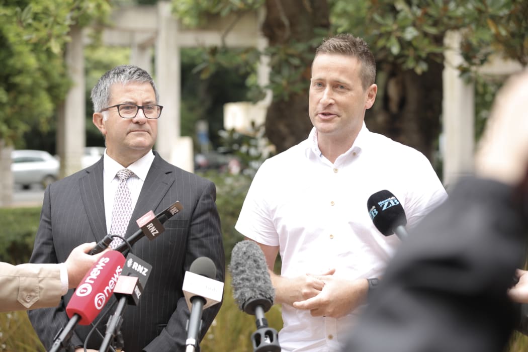 Teina Pora's lawyer Jonathan Krebs, left, and private investigator Tim McKinnel.