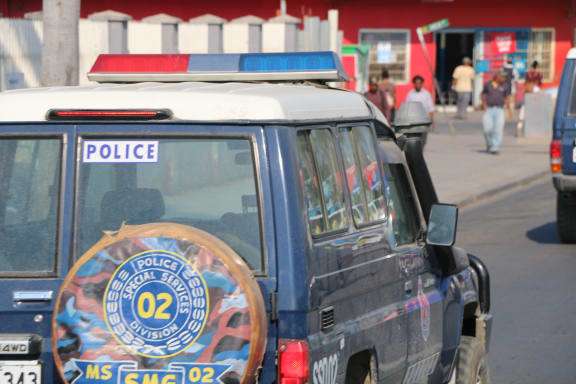 A police landcruiser patrols the streets of the Papua New Guinea capital Port Moresby.