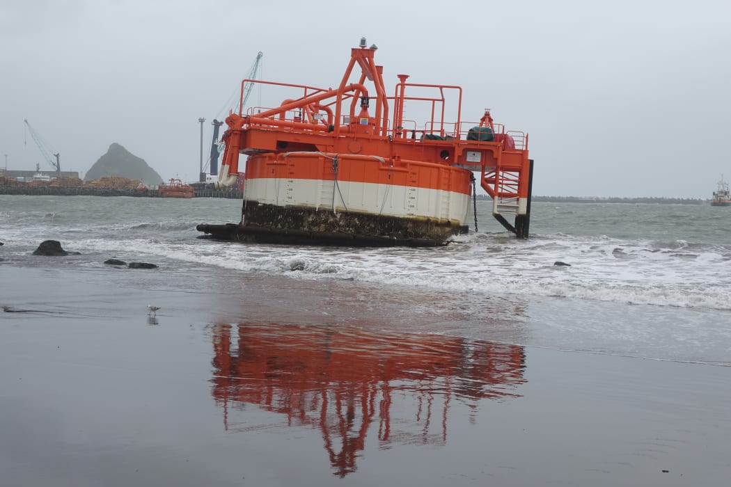 This NZ Steel sand extractor washed up on Ngamotu Beach, Port Taranaki, New Plymouth.