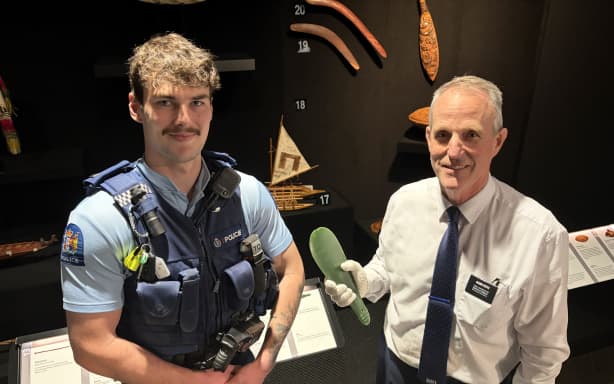 Constable Kyarn Crawford returns the precious mere to Leader Nathan Petty.