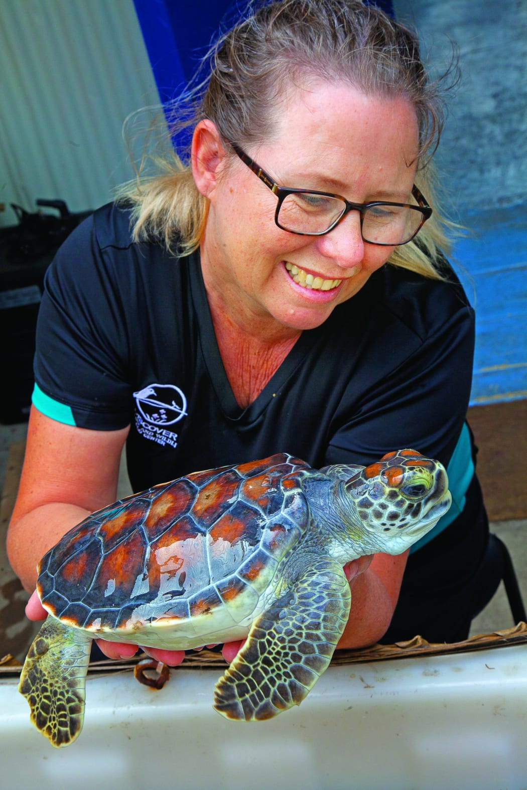 Stephanie Jansen with a recued green turtle being cared for at the Discover Marine and Wildlife Eco Centre in 2019. LOSIRENE LACANIVALU