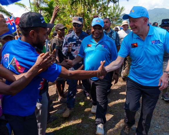 PNG Prime Minister James Marape and Australian Prime Minister Anthony Albanese greet PNG locals