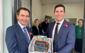 Transport Minister Simeon Brown received a belated birthday cake adorned with a photo of the Ashburton Bridge, from Rangitata MP James Meager.