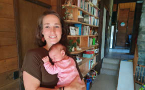 Wellington woman Lindy Jacomb, pictured here with her newborn daughter Aria, was excommunicated by the Exclusive Brethren 13 years ago when she was barely out of her teens.
