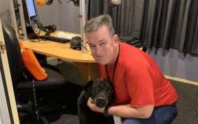 Magic Talk's Sean Plunket and his dog pax in the studio.